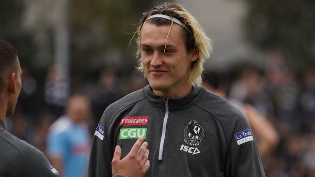 Darcy Moore cracks a smile at Pies open training on Tuesday. Picture: AAP