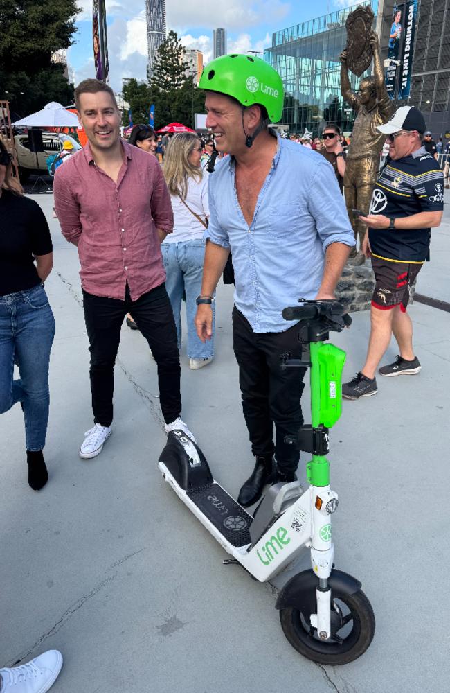 Today Show host Karl Stefanovic getting around Brisbane on a Lime scooter.