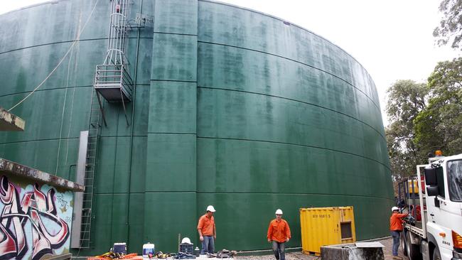 Southern Cross Reservoir Services staff work on the Smithfield water tower PICTURE: ANNA ROGERS