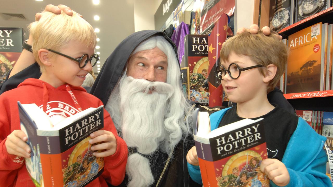 Harry Potter and the Deathly Hallows launch in 2007 with Prof. Dumblewindow and brothers Ryan, then 8, in red and Hayden Kernahan, then 6, in blue at Angus Robertson bookstore.