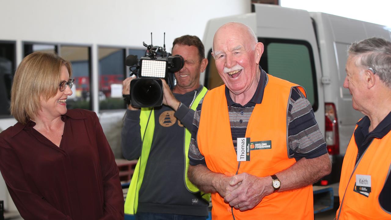 The premier talks to Foodshare volunteers Thomas Harvey and Keith Cumming. Picture: Alan Barber.