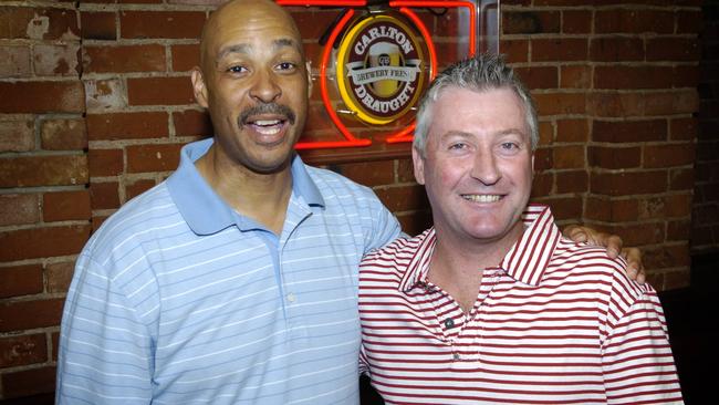 Darryl Pearce catching up with former 36ers teammate David Winslow the Mansions Hotel in the Adelaide CBD. Picture: David Cronin