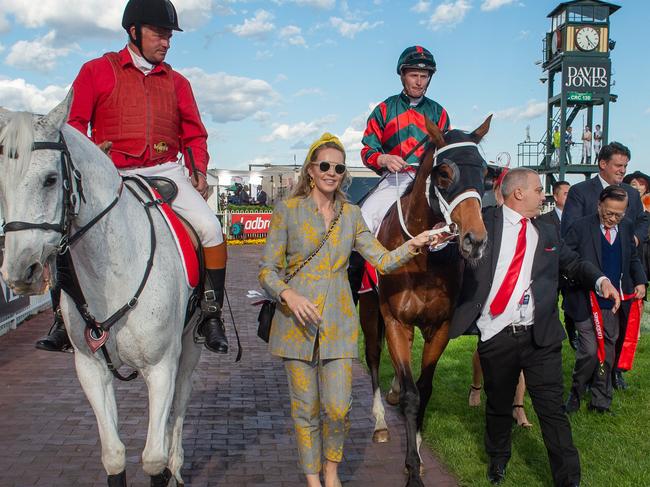 The Autumn Sun and James McDonald return to scale as Alice Messara leads the horse back to scale. Picture Jay Town