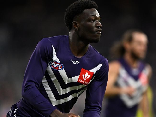 PERTH, AUSTRALIA - JUNE 05: Michael Frederick of the Dockers runs with the ball during the 2022 AFL Round 12 match between the Fremantle Dockers and the Brisbane Lions at Optus Stadium on June 05, 2022 in Perth, Australia. (Photo by Daniel Carson/AFL Photos via Getty Images)