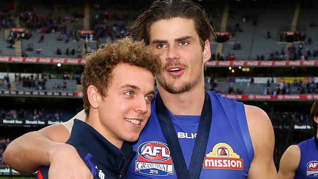 Mitch Wallis and Tom Boyd in the moments after the 2016 Grand Final. Picture: Mark Stewart