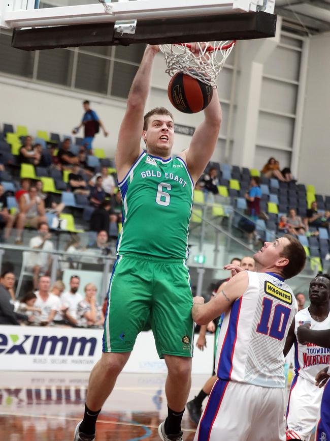 Brent Wallace slam dunking last year for the Rollers. Photo by Richard Gosling