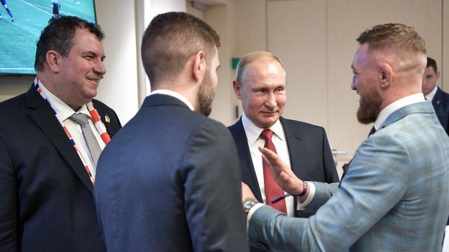 Russian President Vladimir Putin meets Irish MMA fighter Conor McGregor. Photo by Alexei Nikolsky\TASS via Getty Images