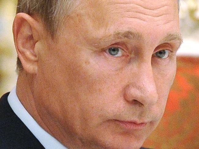 Russian President Vladimir Putin attends a meeting with his Tajikistan's counterpart in Dushanbe on September 15, 2015 before a meeting of the Collective Security Treaty Organisation (CSTO). AFP PHOTO / RIA NOVOSTI / MIKHAIL KLIMENTYEV