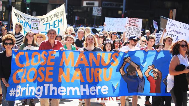 Protesters at a rally to bring refugee children to Australia.