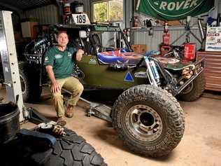 MAKING AN IMPACT: RSL RAEMUS Rover Off-Road Racing managing director Ian Baker at the Karalee workshop. Picture: Rob Williams