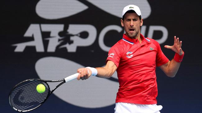 Djokovic will be booed mercilessly in Melbourne. (Photo by DAVID GRAY / AFP)