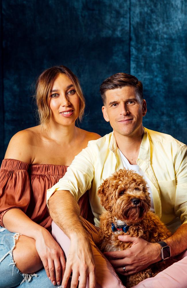 Osher Gunsberg and wife Audrey Griffin with their cavoodle and ring bearer, Frankie. Picture: Jonathan Ng