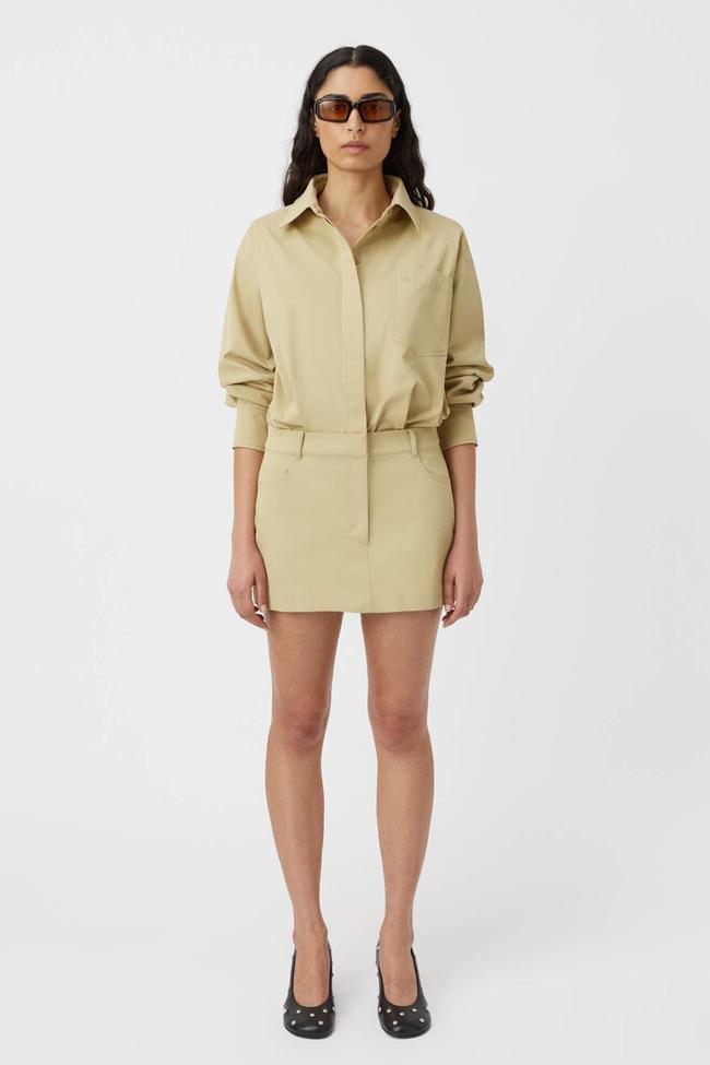 Camilla and MarcAlfven Mini DressThe perfect blend of professional, utilitarian design with modern summery sentiments, this dress by Camilla and Marc takes the best of button-up shirts and tailored mini skirts, and combines them into this ultra-cool, extra versatile piece that’ll suit a day at the office as much as an outdoor lunch.Type: Dress | Material: Recycled polyester, cotton | Colour: Khaki | Delivery: Free shipping for all Australian ordersShop now for $495