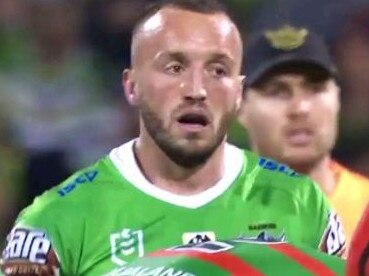 The Raiders' Josh Hodgson gets to his feet after tackling Liam Knight.