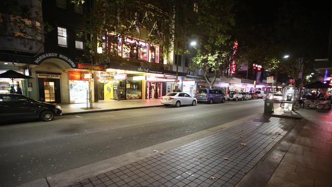 An empty Darlinghurst Rd in a Kings Cross that has become a ghost town. Picture: Bob Barker