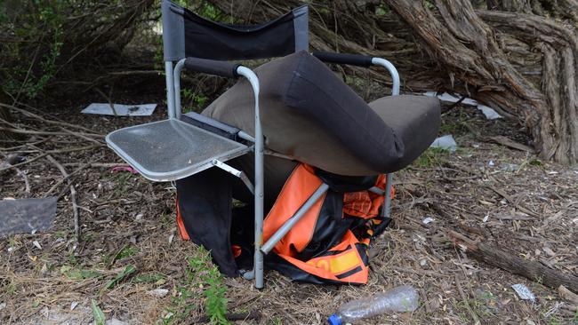 Broken camp chairs left on the beach. Picture: Chris Eastman