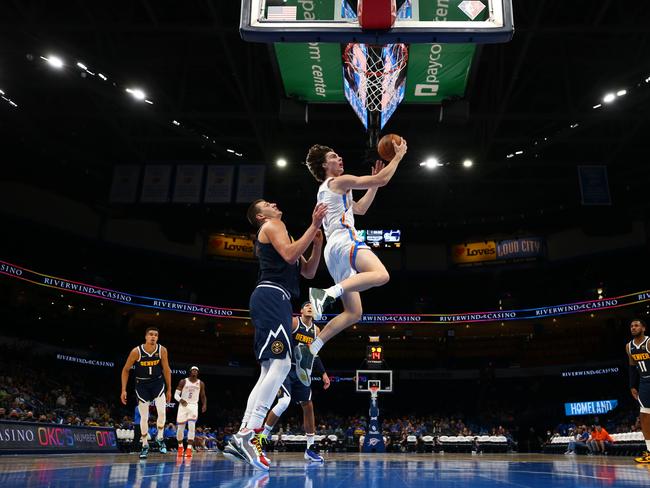 Josh Giddey shoots the ball for Oklahoma City during a preseason game against the Denver Nuggets this month.