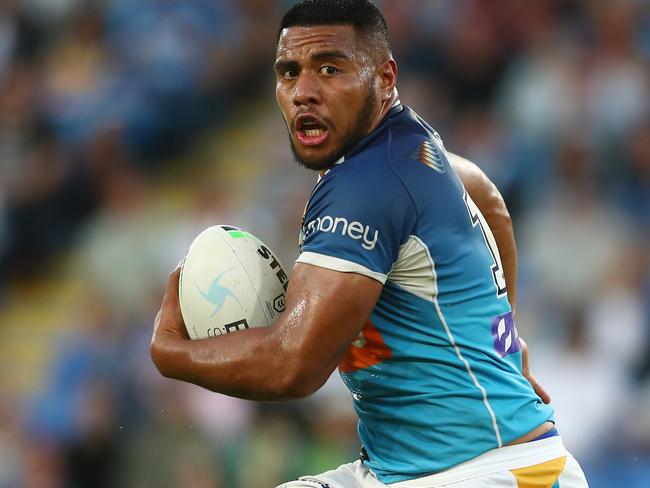 GOLD COAST, AUSTRALIA - MAY 22: Moeaki Fotuaika of the Titans runs the ball during the round 11 NRL match between the Gold Coast Titans and the Canterbury Bulldogs at Cbus Super Stadium, on May 22, 2021, in Gold Coast, Australia. (Photo by Chris Hyde/Getty Images)