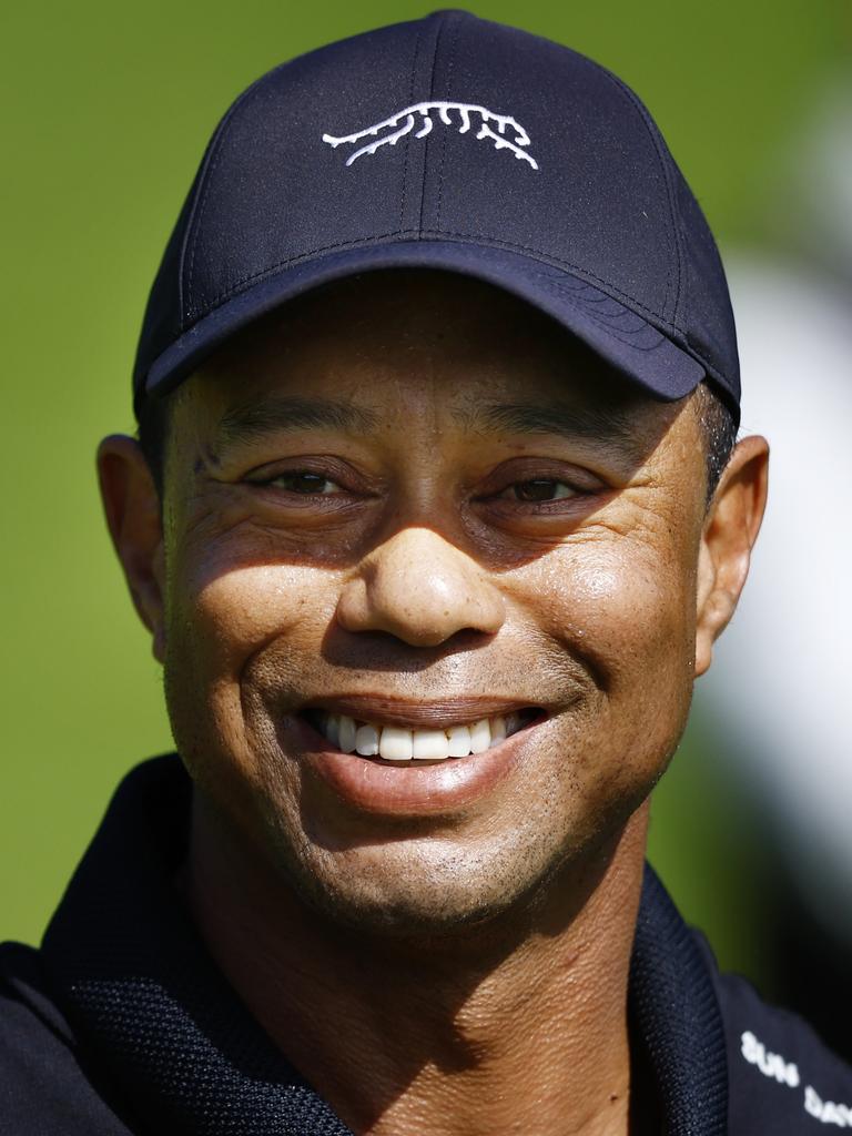 Tiger Woods in his new Sunday Red gear. (Photo by Ronald Martinez/Getty Images)