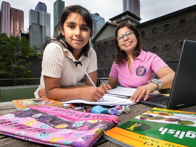 Grade five student 10 year old Belicia Batra with her tutor Reema Verma at RMIT Alumni Courtyard. Picture: Tony Gough