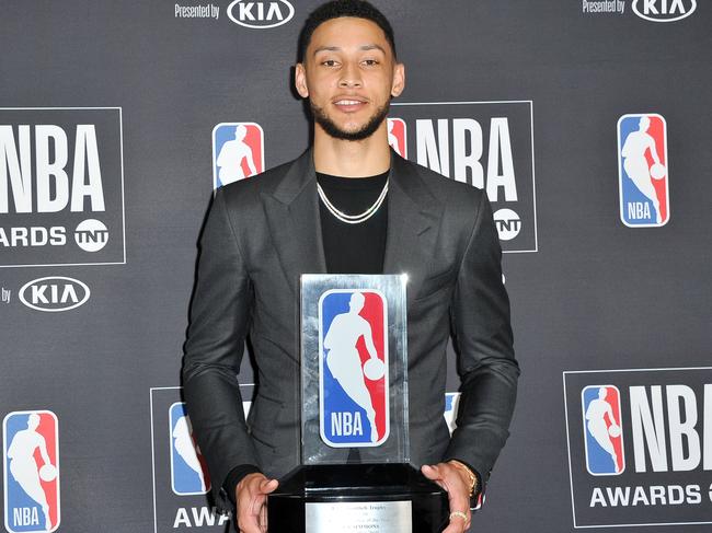 Ben Simmons with his trophy for Rookie of the Year in 2017-18. Picture: Allen Berezovsky/Getty Images