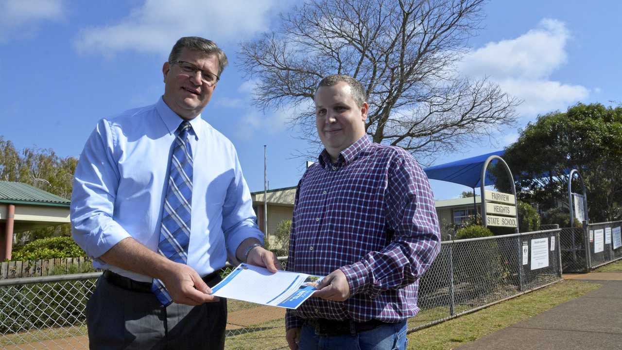 WANTING CHANGE: Petitioning for parking changes at Fairview Heights State School are Toowoomba North MP Trevor Watts (left) and P and C treasurer Scott White. Picture: Tobi Loftus