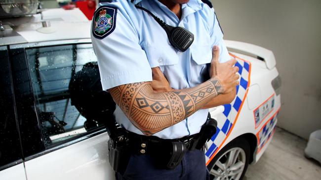 SA Police officers will be allowed to have visible tattoos and male officers long hair under changes aimed at boosting recruitment.