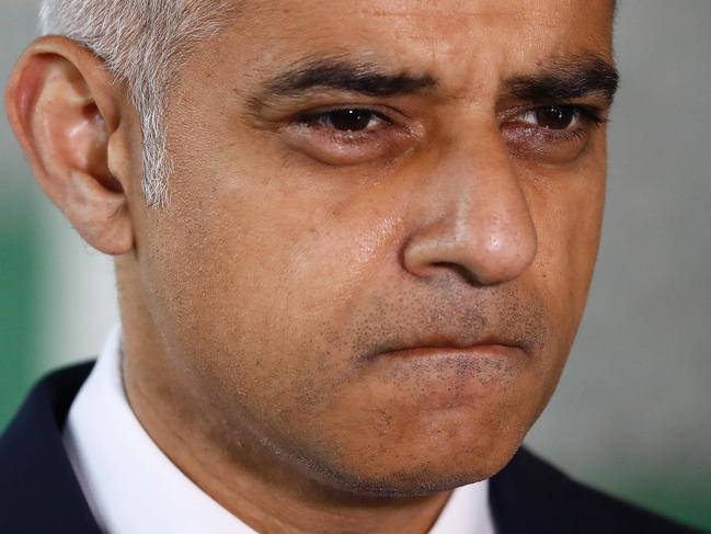 TOPSHOT - Mayor of London Sadiq Khan leaves after observing a minutes' silence with London ambulance staff in London on June 6, 2017, in memory of the victims of the June 3 terror attacks. Police on Monday identified two of the three London attackers as Khuram Butt and Rachid Redouane, after Britain's third terror assault in less than three months, as Prime Minister Theresa May came under mounting pressure over security just days ahead of elections. / AFP PHOTO / Odd ANDERSEN