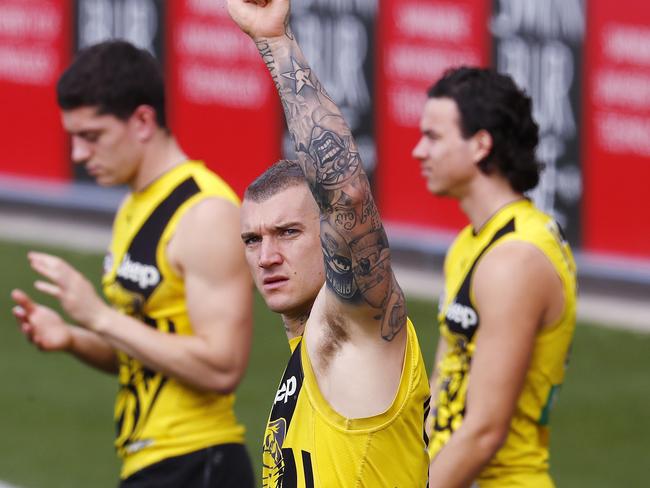 Richmond training. Dustin Martin waves as he comes out to train this morning . Pic: Michael Klein