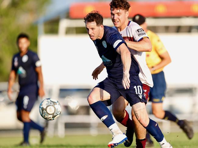 Marlin Coast Rangers player Crios O'Hare beats an MA Olympic defender in the 2024 Crad Evans Shield. Picture: Sharon Woodward.