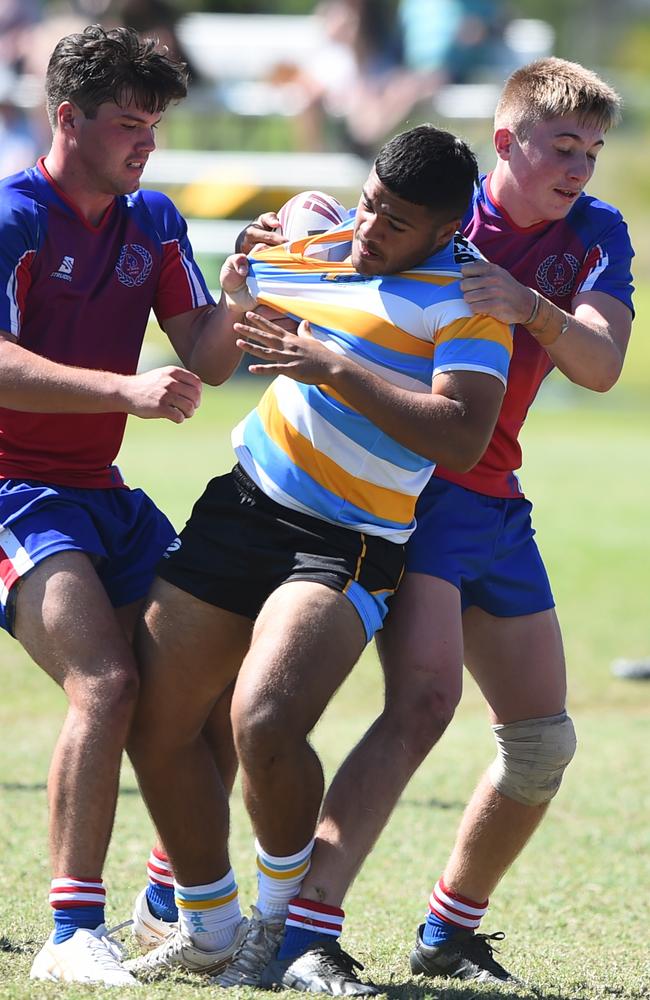 Boys Rugby League State Championship held at Northern Division, Brothers Leagues ground, Townsville. 16-18 years. Peninsula (stripe) v Darling Downs (blue/purple). Jason Hastie of Mareeba SHS