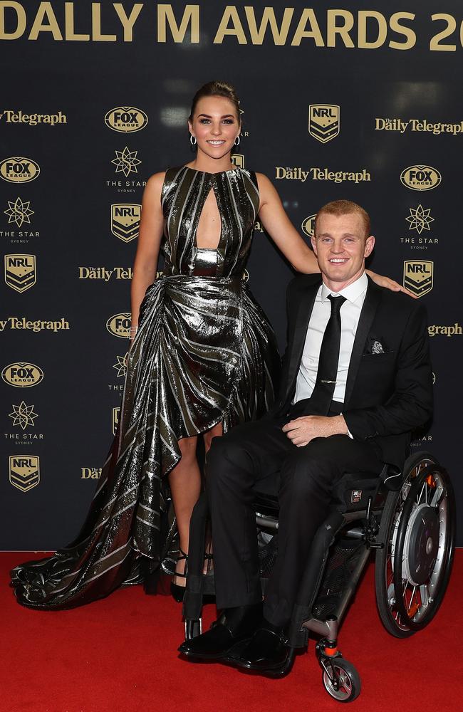 Cute couple: Alex McKinnon with his fiancee Teigan Power. Picture: Brett Costello