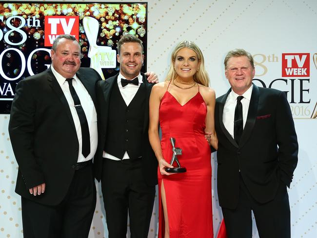 Erin with 'NRL Footy Show co- hosts Darryl Brohman, Beau Ryan and Paul Vautin after winning the Logie Award for Best Sports Program in 2016. Photo: Scott Barbour/Getty Images