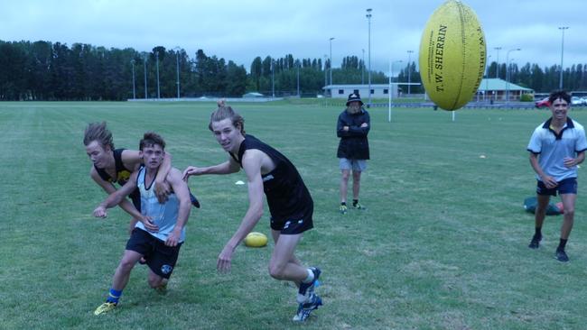 Northern Heat squad members get put through their paces in torrential rain at Armidale.