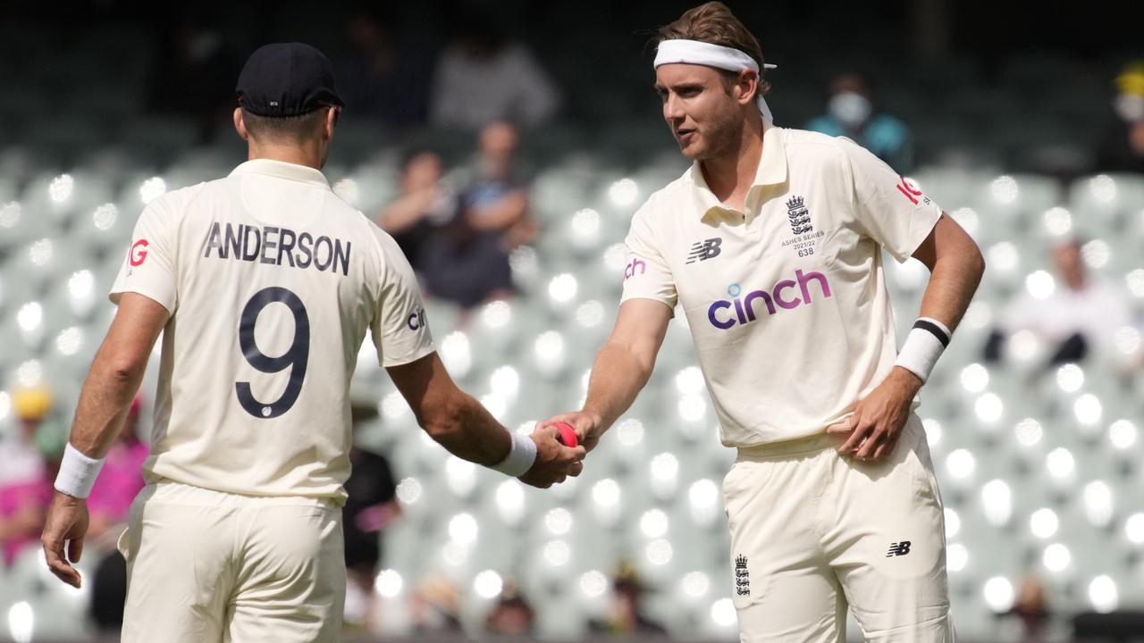 ADELAIDE, AUSTRALIA - DECEMBER 19: James Anderson of England and Stuart Broad (R) of England speak during day four of the Second Test match in the Ashes series between Australia and England the at Adelaide Oval on December 19, 2021 in Adelaide, Australia. (Photo by Daniel Kalisz/Getty Images)