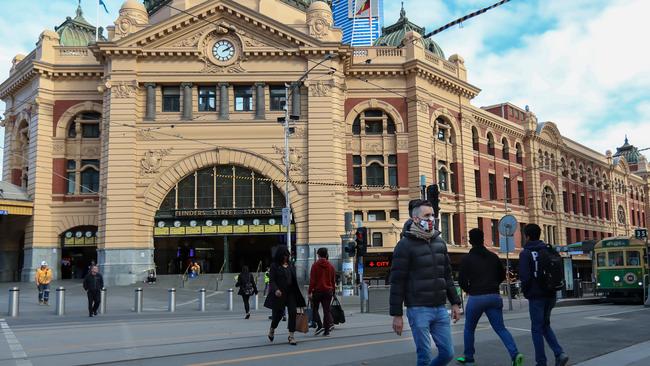 People wearing masks in Melbourne during the Covid-19 pandemic. Picture: Alex Coppel.