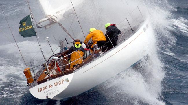 Love &amp; War punches into Bass Strait in the 2004 race. Pic: Ian Mainsbridge