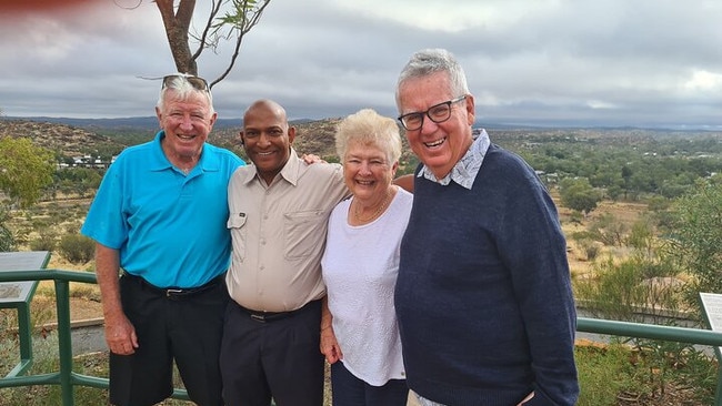 Alice Holiday Tours owner Mahesh Mahendra, second from left.