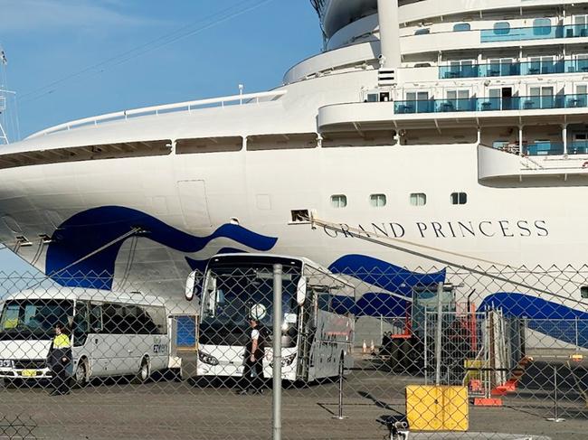 Bus drivers await as the cruise ship Grand Princess arrives in Adelaide with passengers suffering  Covid aboard. Picture: Eva Blandis