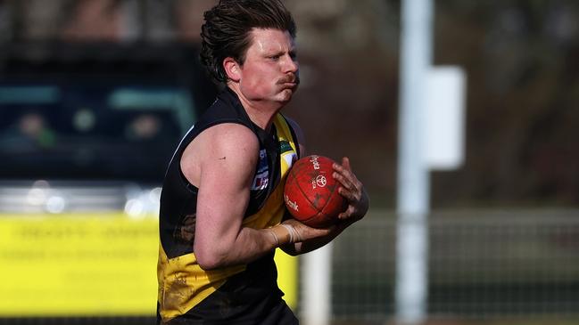 Lukas Fellows marks for Lancefield. Picture: Hamish Blair