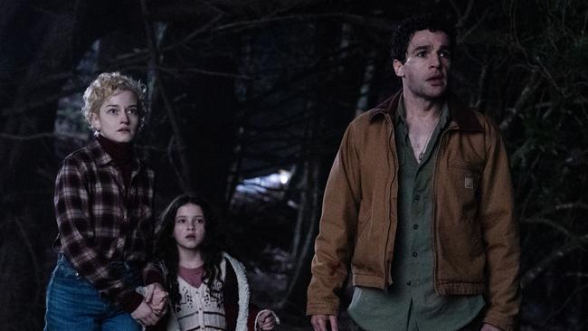 From left, Charlotte (Julia Garner), Ginger (Matilda Firth) and Blake (Christopher Abbott) in Wolf Man, directed by Leigh Whannell.