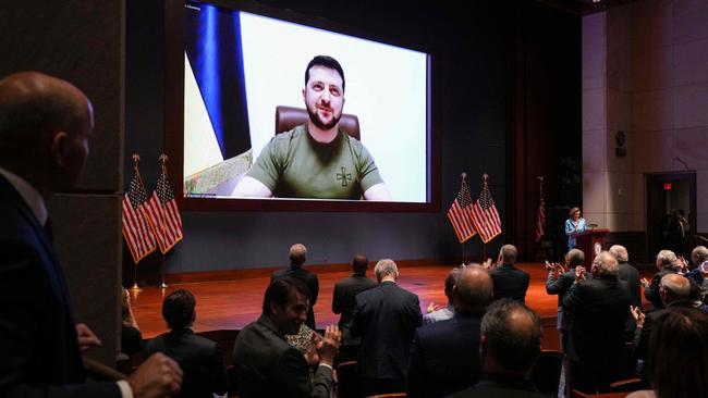 Ukrainian President Volodymyr Zelensky virtually addresses the US Congress on March 16, 2022, at the US Capitol Visitor Center Congressional Auditorium, in Washington, DC. (Photo by J. Scott Applewhite / POOL / AFP)