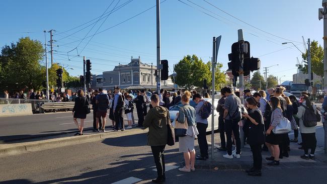 Passengers try to get to work at Clifton Hill after trains were delayed by signal failure. Picture: Ed Gardiner