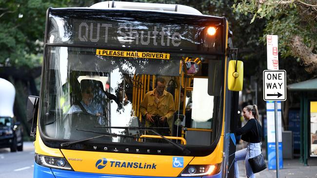 BRISBANE, AUSTRALIA - NCA NewsWire Photos AUGUST, 05, 2020.QUT university students board a bus in Brisbane. Students face losing their concession fares because Translink loophole doesn't grant cheaper fares to external students.Picture: NCA NewsWire/Dan Peled