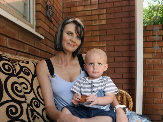 Mariandra Heunis with "AJ", who was born just days after his father was murdered in front of his family’s eyes.