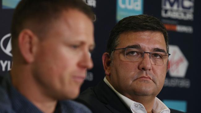 Carlton president Mark LoGiudice listens to sacked coach Brendon Bolton on Monday. Picture: Michael Klein.