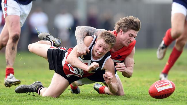 Mt Eliza's Brodie Shaw tackles a Bonbeach’s Beau Bailey. Picture: Jason Sammon.