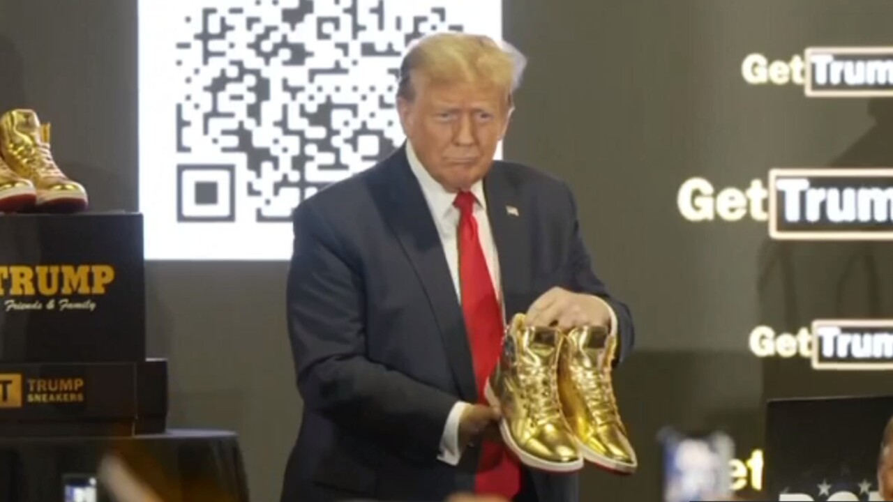 Man buys Trump’s gold sneakers for nine grand at auction Herald Sun