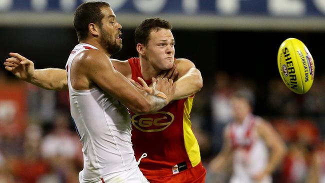 Lance Franklin battles Steven May. Picture: Adam Head