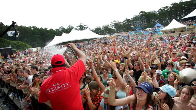 Crowds get a cooling off in the sweltering heat at Falls in Lorne. Picture: Andrew Henshaw.